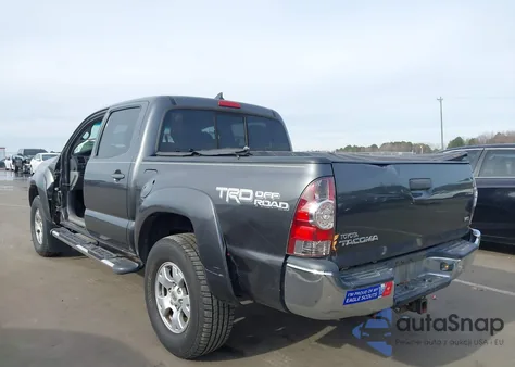 2014 Toyota Tacoma Base V6 z USA, uszkodzony, nr VIN 3TMLU4EN1EM162480